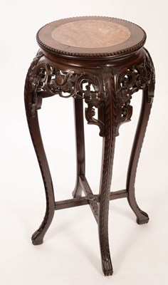 Lot 406 - A Chinese jardinière stand with inset marble...