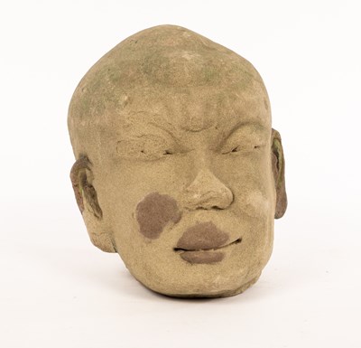 Lot 411 - A Chinese carved stone head, Yuan dynasty,...