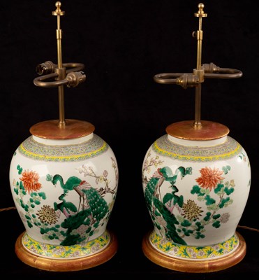 Lot 416 - A pair of Chinese famille rose porcelain jars,...