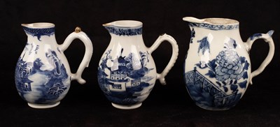 Lot 426 - Three Chinese blue and white sparrow beak jugs,...