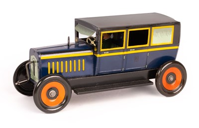 Lot 474 - A German tinplate Hess mobile with driver and...