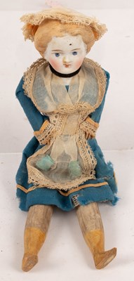 Lot 488 - A bisque head doll with wooden legs and arms,...