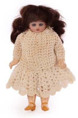 Lot 491 - A German small bisque head doll with sleepy...