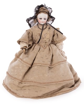 Lot 499 - A French pressed bisque head fashionable doll...