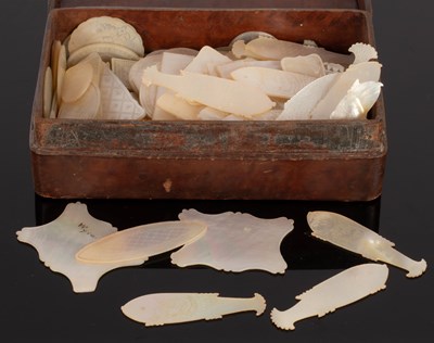 Lot 522 - A quantity of mother-of-pearl gaming counters,...