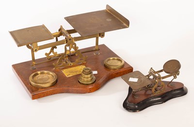 Lot 523 - A set of late 19th Century parcel scales on an...