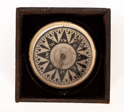 Lot 546 - A ship's compass, boxed, the dial 16cm diameter