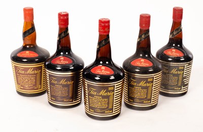 Lot 660 - Spirits; Tia Maria, a quart bottle and two...