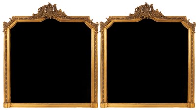 Lot 703 - A pair of gilt framed overmantel mirrors, the...