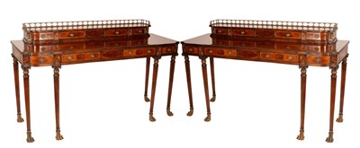 Lot 704 - A pair of Georgian style console tables by...