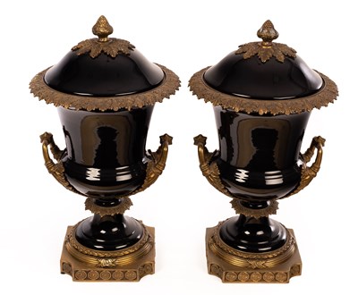 Lot 705 - A pair of gilt metal mounted campana shaped...