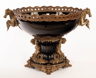 Lot 708 - A gilt metal mounted table centrepiece, the...