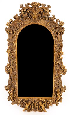 Lot 711 - A gilt framed mirror, decorated foliate...