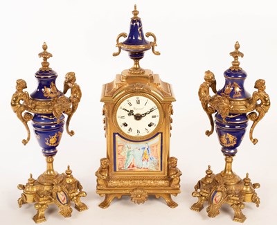 Lot 744 - A French style porcelain and gilt metal...