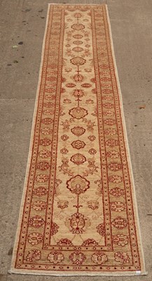 Lot 746 - An Eastern runner, 462cm x 72cm/Provenance:...