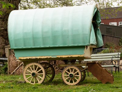 Lot 788 - A child's gypsy bow-top caravan with a canvas...