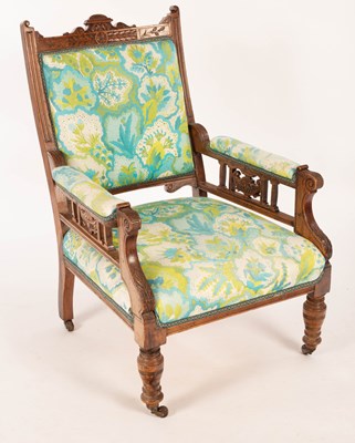 Lot 802 - An Edwardian open armchair on turned front legs