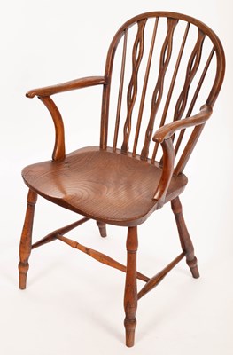 Lot 807 - A Windsor type armchair with pierced splats...