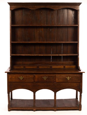 Lot 813 - A late 19th Century oak dresser, fitted three...