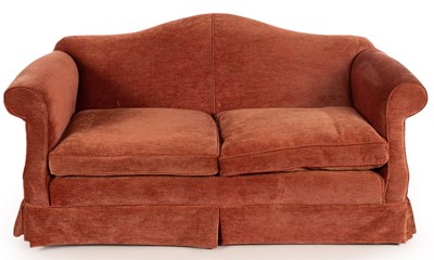 Lot 845 - An upholstered camel back sofa fitted loose...