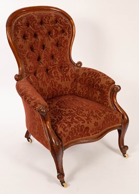 Lot 853 - A Victorian walnut button back armchair on...