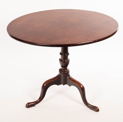 Lot 857 - An 18th Century oak table on a turned column...