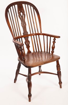 Lot 859 - A yew and elm stick back armchair on turned...