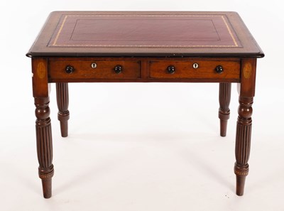 Lot 863 - A mid 19th Century oak writing table, fitted...