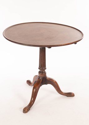 Lot 868 - A George III mahogany tripod table, on turned...