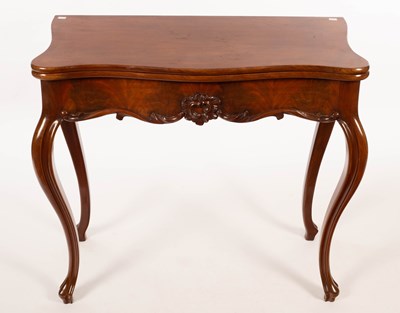 Lot 888 - A Victorian mahogany tea table, the fold-over...