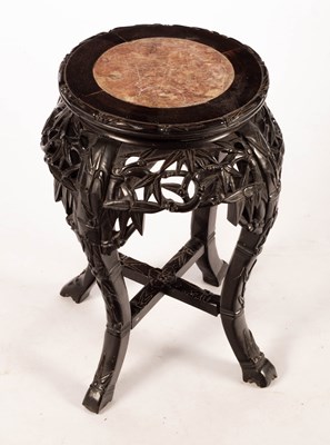 Lot 895 - A Chinese pierced and carved hardwood...