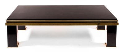 Lot 901 - A Maison Jansen black and gold coffee table,...