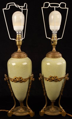 Lot 936 - A pair of French table lamps of speckled green...