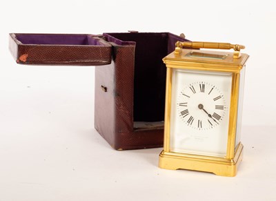 Lot 941 - A gilt brass eight-day carriage clock, the...