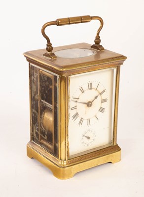 Lot 947 - A gilt brass half-hour strike carriage alarm...