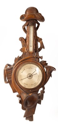 Lot 949 - A mid 19th Century wheel barometer in a Black...