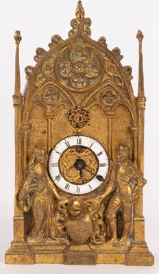 Lot 952 - A small French Gothic table clock with poppy...