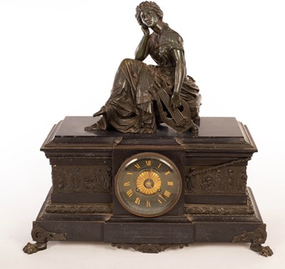 Lot 955 - A 19th Century black slate clock with a bronze...