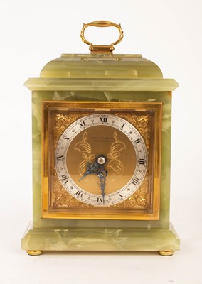 Lot 956 - An onyx cased mantel clock, the square dial...