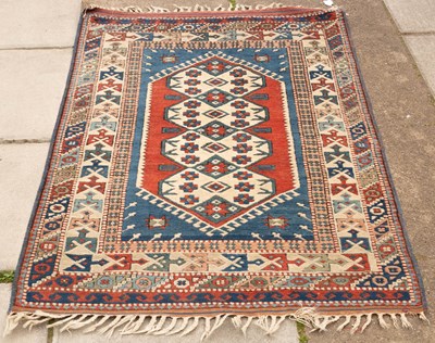 Lot 1002 - A Turkish rug, 165cm x 103cm