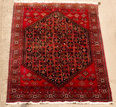 Lot 1003 - A Belouch carpet, North East Persia, 300cm x...