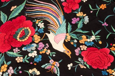 Lot 1013 - A Chinese black silk shawl with fringed border,...