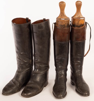 Lot 1016 - Two pairs of riding boots, the length of the...