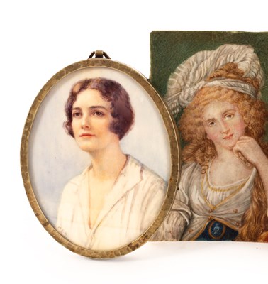 Lot 1048 - Two portrait miniatures of women, one wearing...