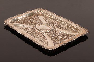 Lot 5 - A Victorian embossed silver tray, WJH,...
