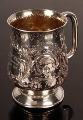 Lot 32 - A Victorian silver embossed mug, Hilliard &...