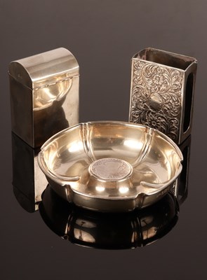 Lot 38 - A hexagonal silver ashtray, London 1914, the...