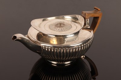 Lot 63 - A George III silver teapot, William Bennett,...