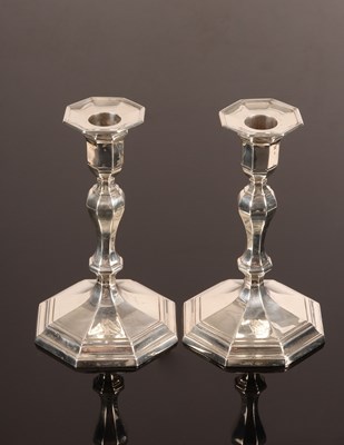 Lot 110 - A pair of Victorian silver candlesticks,...