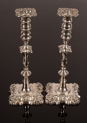 Lot 122 - A pair of late Victorian silver candlesticks...